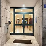 At 61 Charm Center *